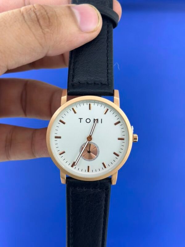 TOMI